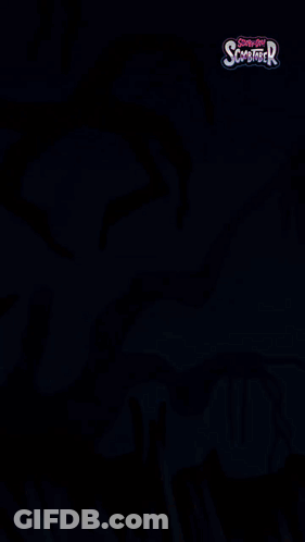 A Poster For Scooby Doo Scarifier With A Silhouette Of A Monster In The Background GIF