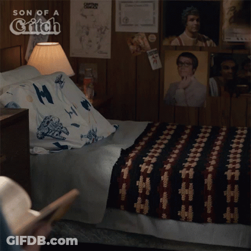 A Poster For Son Of A Glitch Shows A Man Jumping Into A Bed GIF