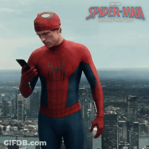 A Poster For Spider-Man Brand New Day Shows A Man In A Spiderman Suit Looking At His Phone GIF