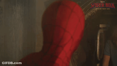A Poster For Spider-Man Grand New Day Shows A Close Up Of The Face Of Spider-Man GIF