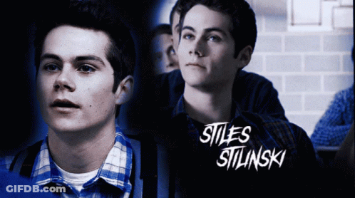 A Poster For Stiles Stilinski Shows A Man In A Blue Plaid Shirt GIF
