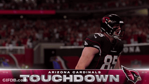 A Poster For The Arizona Cardinals Touchdown With Two Players On The Field GIF