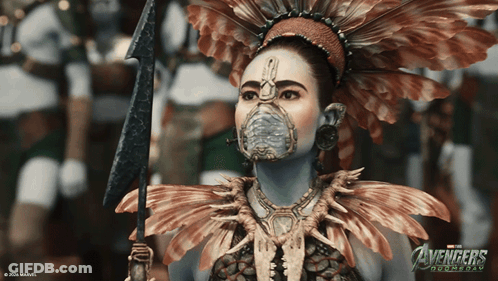 A Poster For The Avengers Doomsday Shows A Woman In A Native American Costume GIF