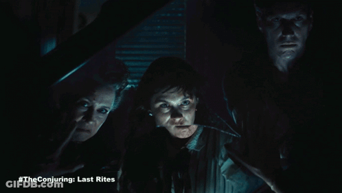 A Poster For The Conjuring Last Rites With A Group Of People Screaming GIF