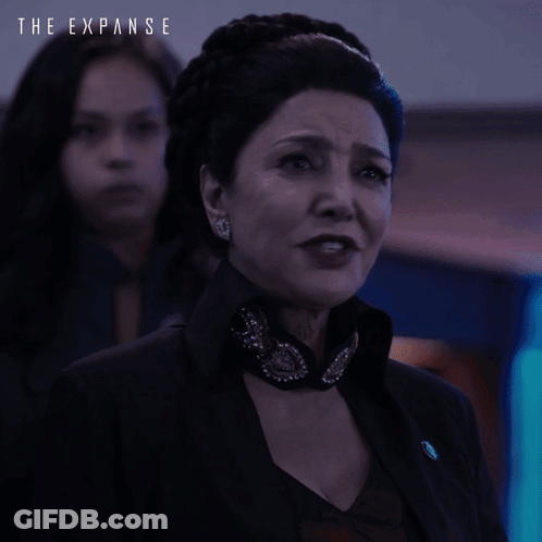 A Poster For The Expanse Shows A Woman Crying And Says Just Get To The Fucking Point GIF
