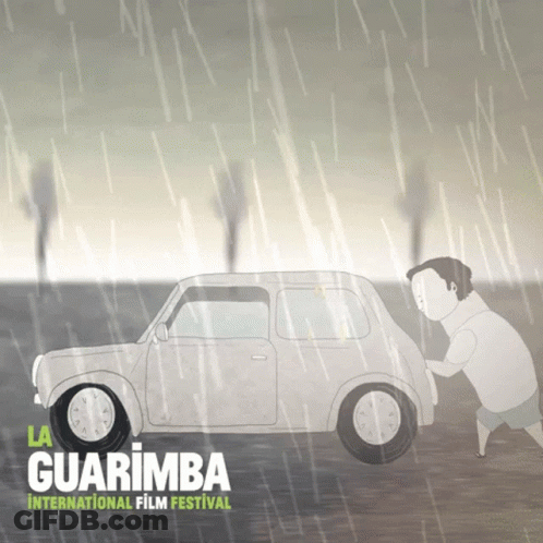 A Poster For The Guarimba International Film Festival Shows A Man Pushing A Car GIF