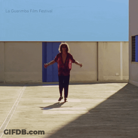 La Guarimba Film Festival Poster Man In Red Shirt GIF