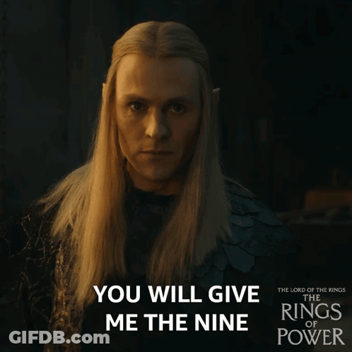 A Poster For The Lord Of The Rings Of Power Shows A Man With Long Blonde Hair GIF