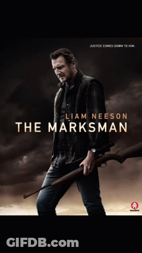 A Poster For The Marksman Shows A Man Holding A Gun GIF
