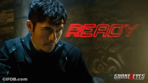 A Poster For The Movie Snake Eyes Shows A Man GIF