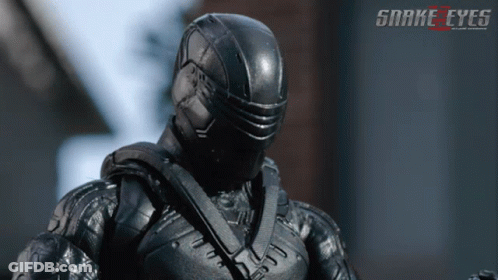 A Poster For The Movie Snake Eyes Shows A Man In A Black Helmet GIF