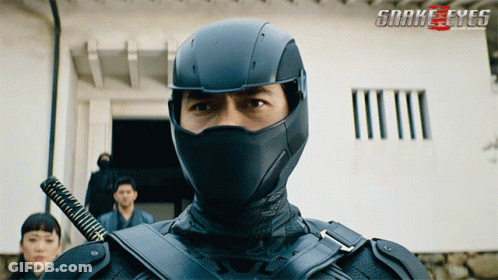 A Poster For The Movie Snake Eyes Shows A Man In A Black Mask GIF