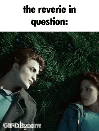 A Poster For The Twilight Saga Shows A Man And A Woman Laying On The Grass GIF