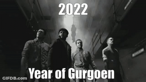 A Poster For The Year Of Gurgoen Shows A Group Of Men Standing In A Hallway GIF