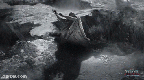A Poster For Thor The Dark World Shows A Man In A Cape GIF