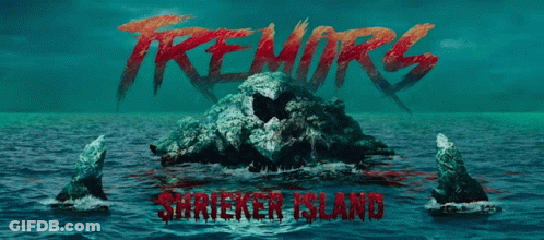 A Poster For Tremors Showing A Skull On A Small Island GIF