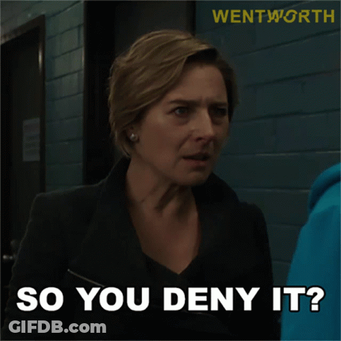 A Poster For Wentworth Shows A Woman In A Dark Room GIF