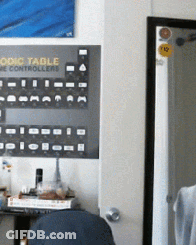 A Poster On A Wall That Says ' Periodic Table Of Game Controllers ' GIF