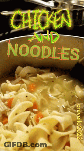 A Pot Of Chicken And Noodles Being Cooked GIF