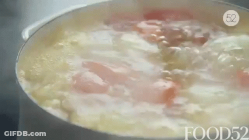 A Pot Of Soup Is Being Cooked On A Stove With The Words Food52 On The Bottom . GIF