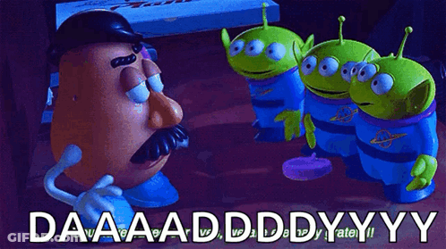 A Potato Head With A Mustache Is Surrounded By Three Green Aliens From Toy Story GIF
