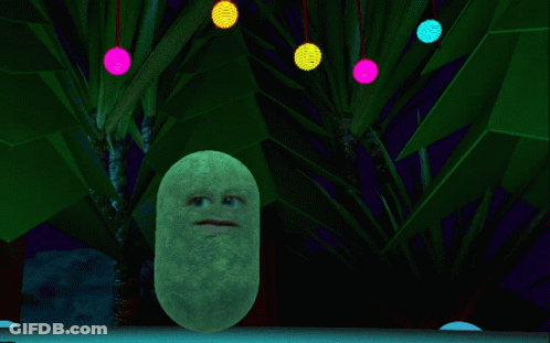 A Potato With A Face Is Standing In Front Of A Tree With Christmas Lights Hanging From It GIF