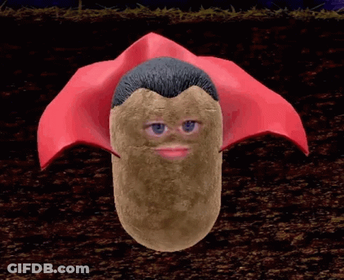 A Potato With A Man 'S Face And Blue Eyes Is Wearing A Red Cape GIF