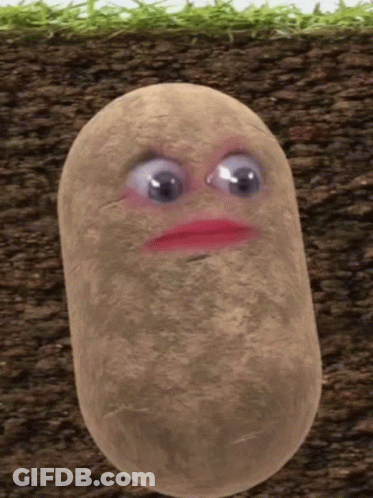 A Potato With Big Eyes And A Pink Lip Is In The Dirt GIF