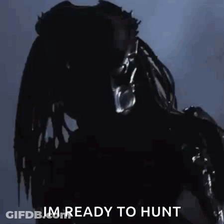 A Predator From The Movie Predator Is Ready To Hunt Someone . GIF