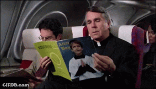 A Priest Reads A Book Called Alter Boy GIF