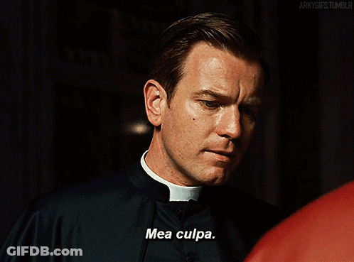 A Priest Says Mea Culpa In Front Of A Red Shirt GIF