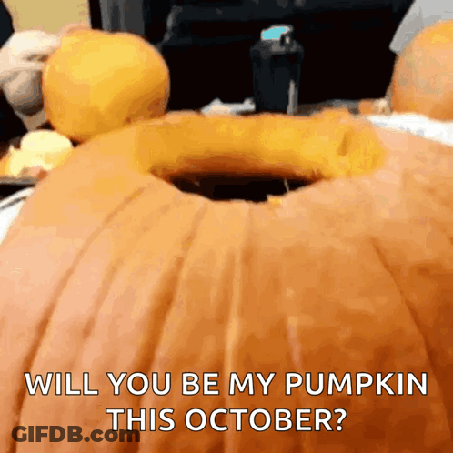 A Pumpkin With A Hole In It And The Words Will You Be My Pumpkin This October Written On It GIF