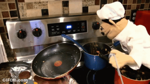 A Puppet Chef Is Cooking On A Stove With The Time 2:08 GIF