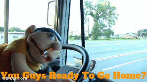 A Puppet Driving A Bus With The Words " You Guys Ready To Go Home " Below It GIF
