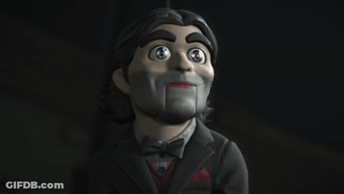 A Puppet Is Giving A Thumbs Up With A Heart In His Mouth GIF