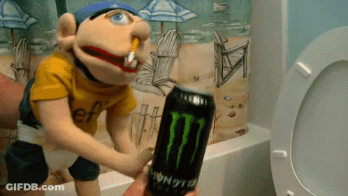 A Puppet Is Holding A Monster Energy Drink In Front Of A Toilet GIF