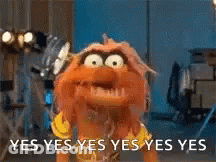 A Puppet Is Standing In Front Of A Sign That Says Yes Yes Yes Yes Yes . GIF