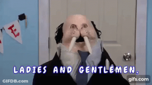 A Puppet Of A Walrus Is Standing In Front Of A Door And Says `` My Name Is Wobbly Walrus '' . GIF