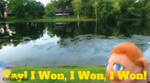A Puppet Stands In Front Of A Lake With The Words Yay I Won I Won I Won GIF