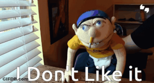 A Puppet With A Cigarette In His Mouth And The Words " I Don 'T Like It " GIF