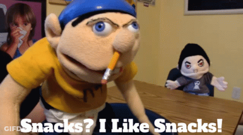 A Puppet With A Pencil In His Mouth And The Words Snacks I Like Snacks Below It GIF