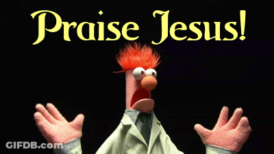 A Puppet With Red Hair Is Standing In Front Of A Black Background That Says Praise Jesus GIF
