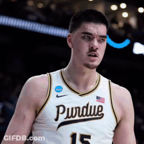 A Purdue Basketball Player Wearing Number 15 Stands On The Court GIF