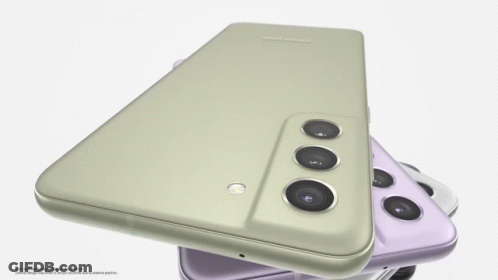 A Purple And A Green Samsung Phone Laying On Top Of Each Other GIF