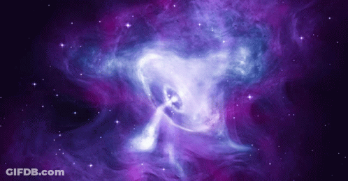 A Purple And Blue Galaxy With A Few Stars GIF
