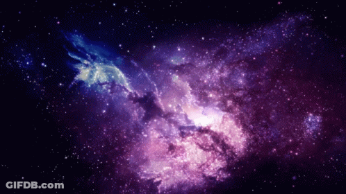 A Purple And Blue Galaxy With Many Stars GIF
