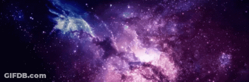 A Purple And Blue Galaxy With Many Stars GIF