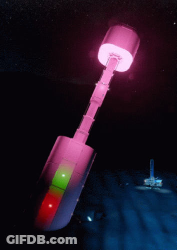A Purple And Green Object Is Floating In The Dark GIF