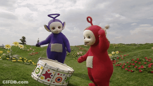A Purple And Red Teletubbies Are Playing A Drum GIF