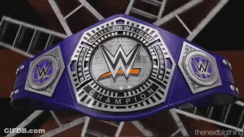 A Purple And Silver Wrestling Belt That Says Cruiserweight Champion On It GIF
